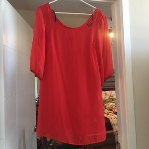 Red sleeved dress with bow on the back